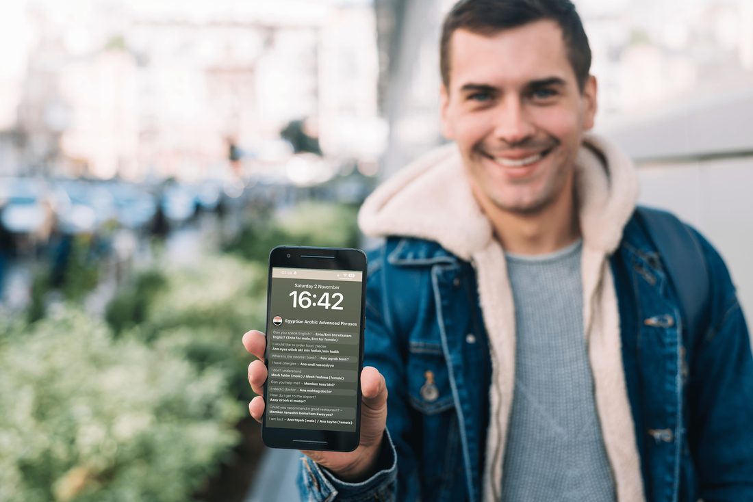 A traveller on a city street showing the Phrase Path lock screen